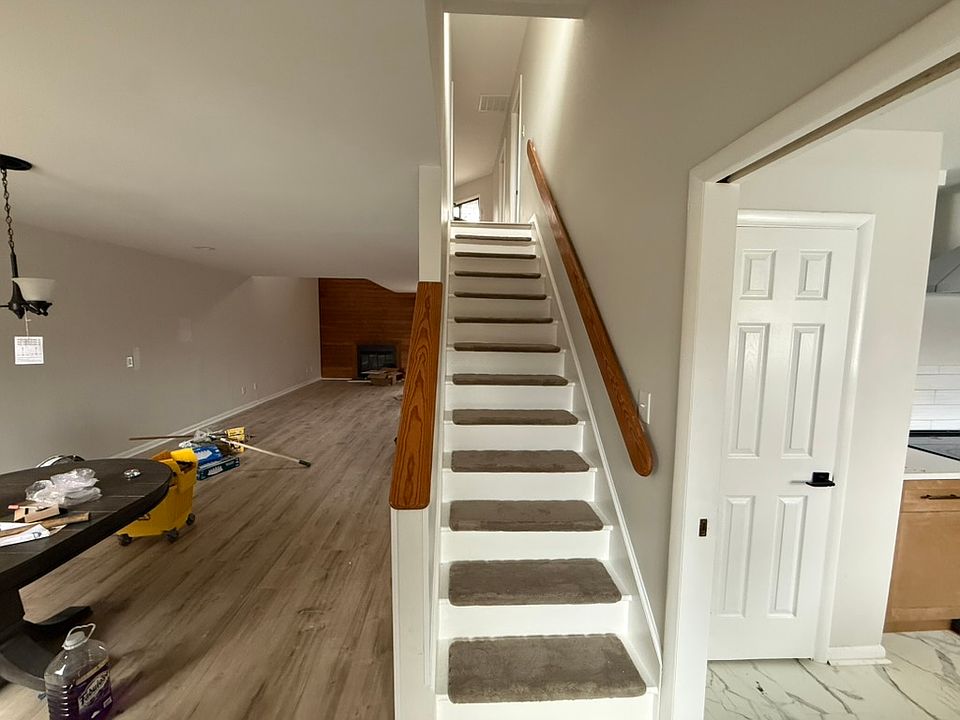 Entryway kitchen to the right, dining area to the left
