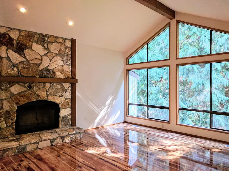 The master bedroom enjoys its own fireplace.