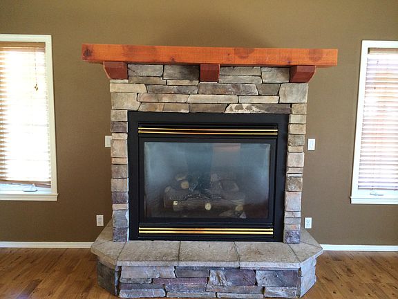 7' high stone/gas fireplace
