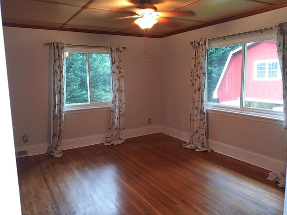 Master Bedroom. Studio or shop building visible through window.