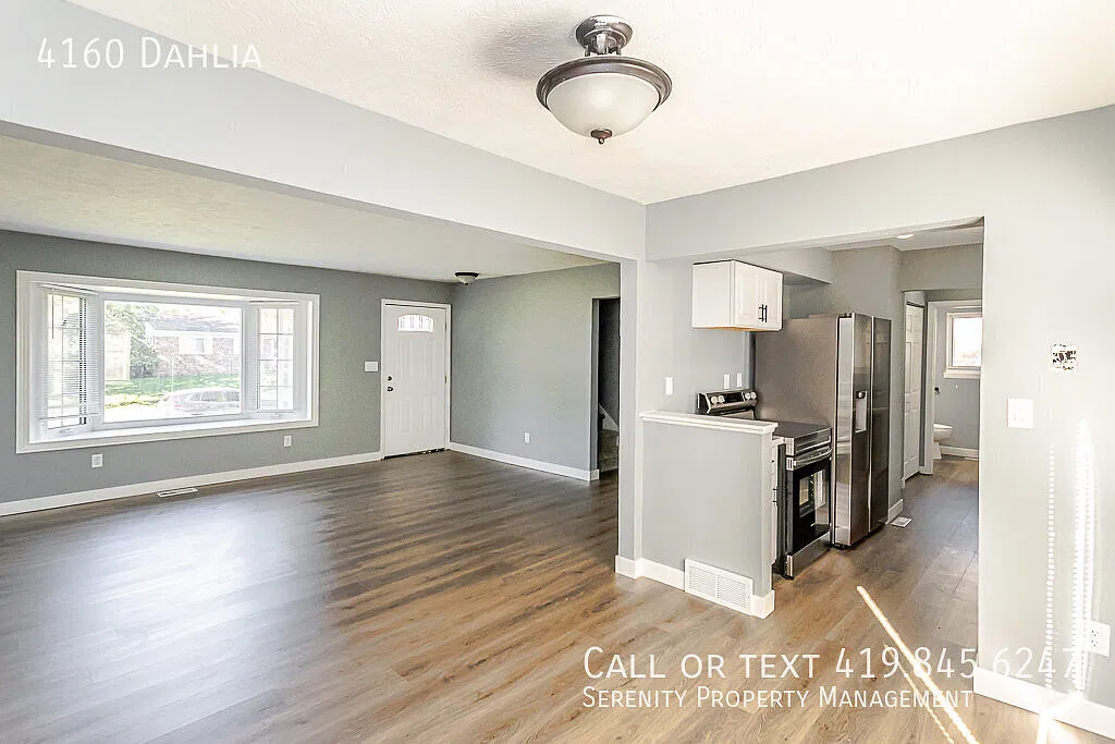 Fall in Love with Your New Home! Beautifully Remodeled 5-Bedroom Home — Photo 4