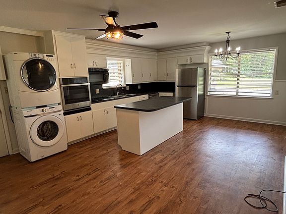 open kitchen with dinette and extra space
