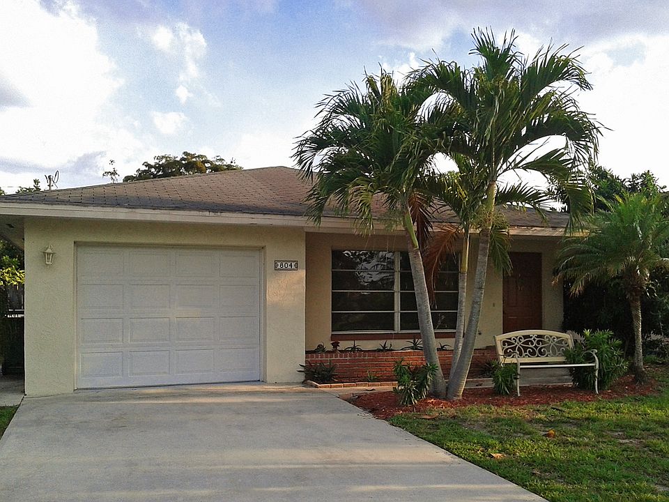 House Front, Garage & Driveway.