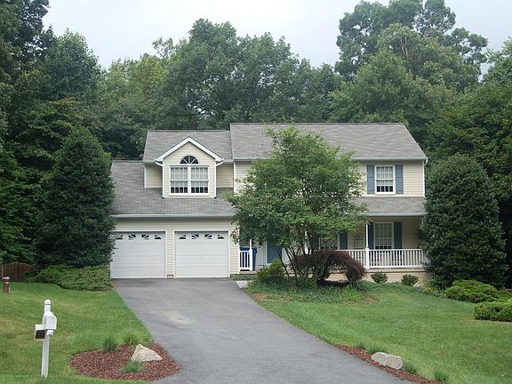 Front porch and two-car garage