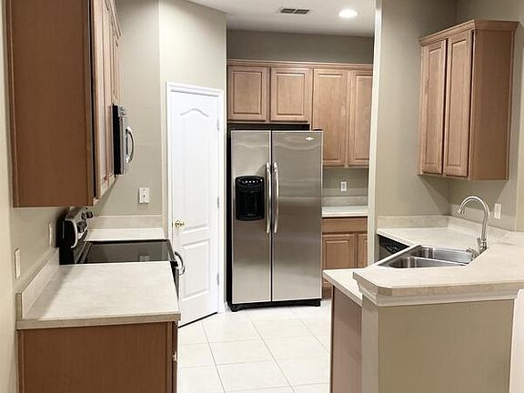5th image of 3430 Pine Oak Trl #1