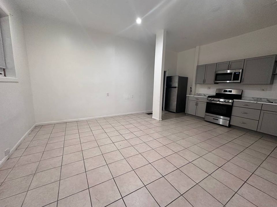 Living space is an open floor plan which allows for endless layout options.