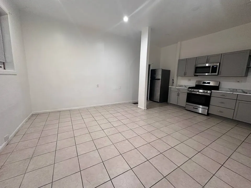 Living space is an open floor plan which allows for endless layout options.