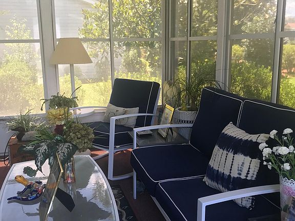 Lovely lanai with television