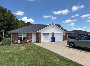 208-210 NW Woodbury Dr, Grain Valley, MO 64029