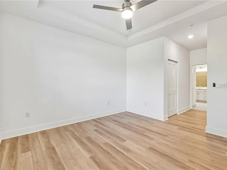 Primary bedroom with walk in closet