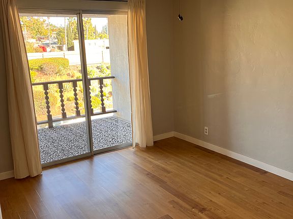Bedroom opens up to balcony