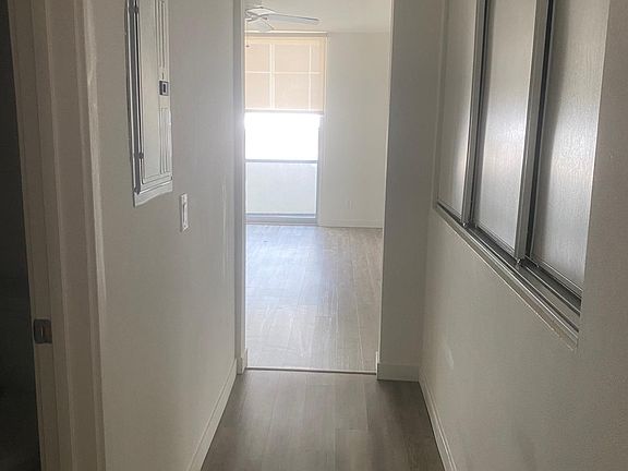 Side by side laundry in side cabinet