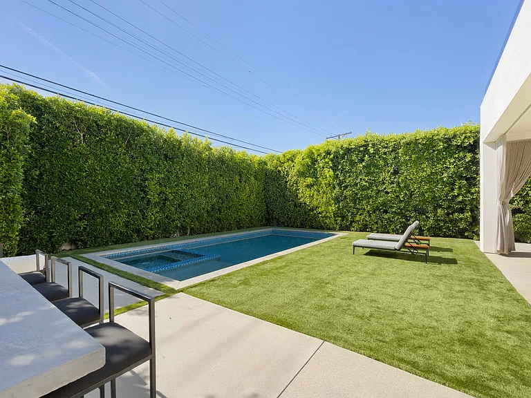 Enjoy a refreshing afternoon in the pool with your favourite beverage