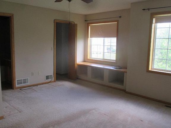 master bedroom with walk in closet