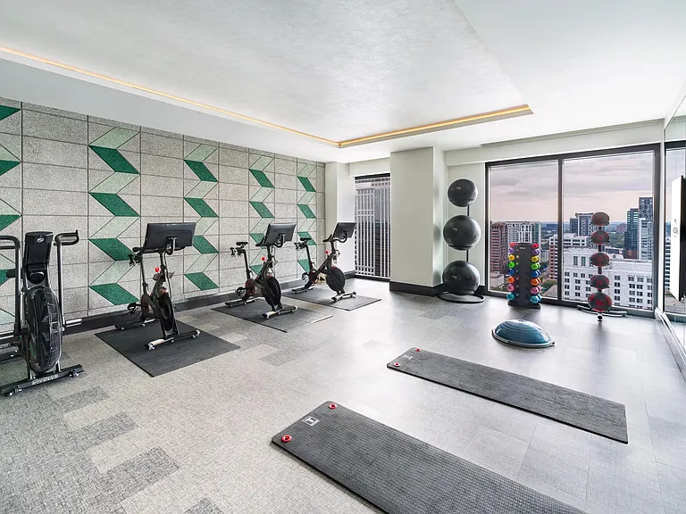 Our light-filled fitness studio at Modera Parkside in Atlanta pairs skyline views with space to train, stretch, and recharge just moments from Midtown.