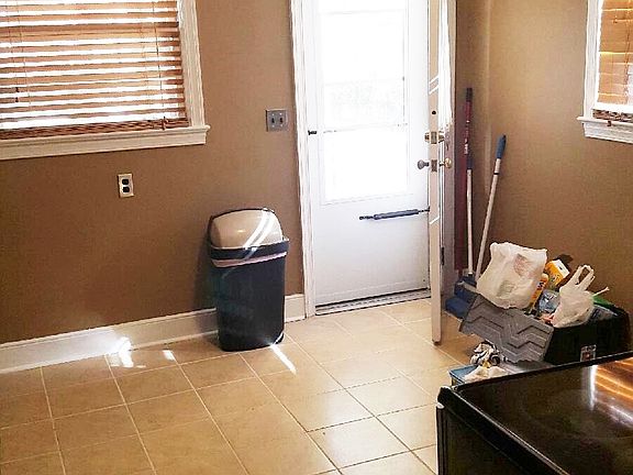 Kitchen leading to back Deck