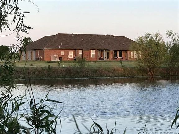 Private Fishing Pond shared w/ 2 adjacent neighbors-looking East to back of Home.