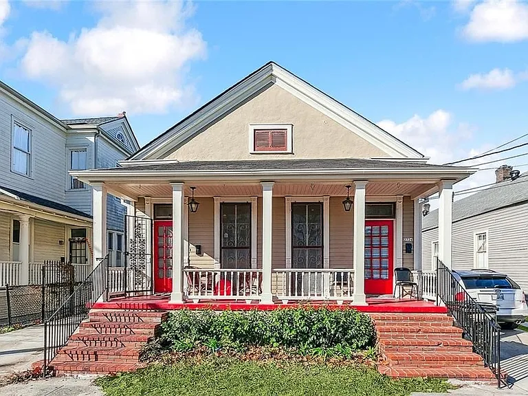 Gated off-street parking for 2722 left hand side of historic double home.