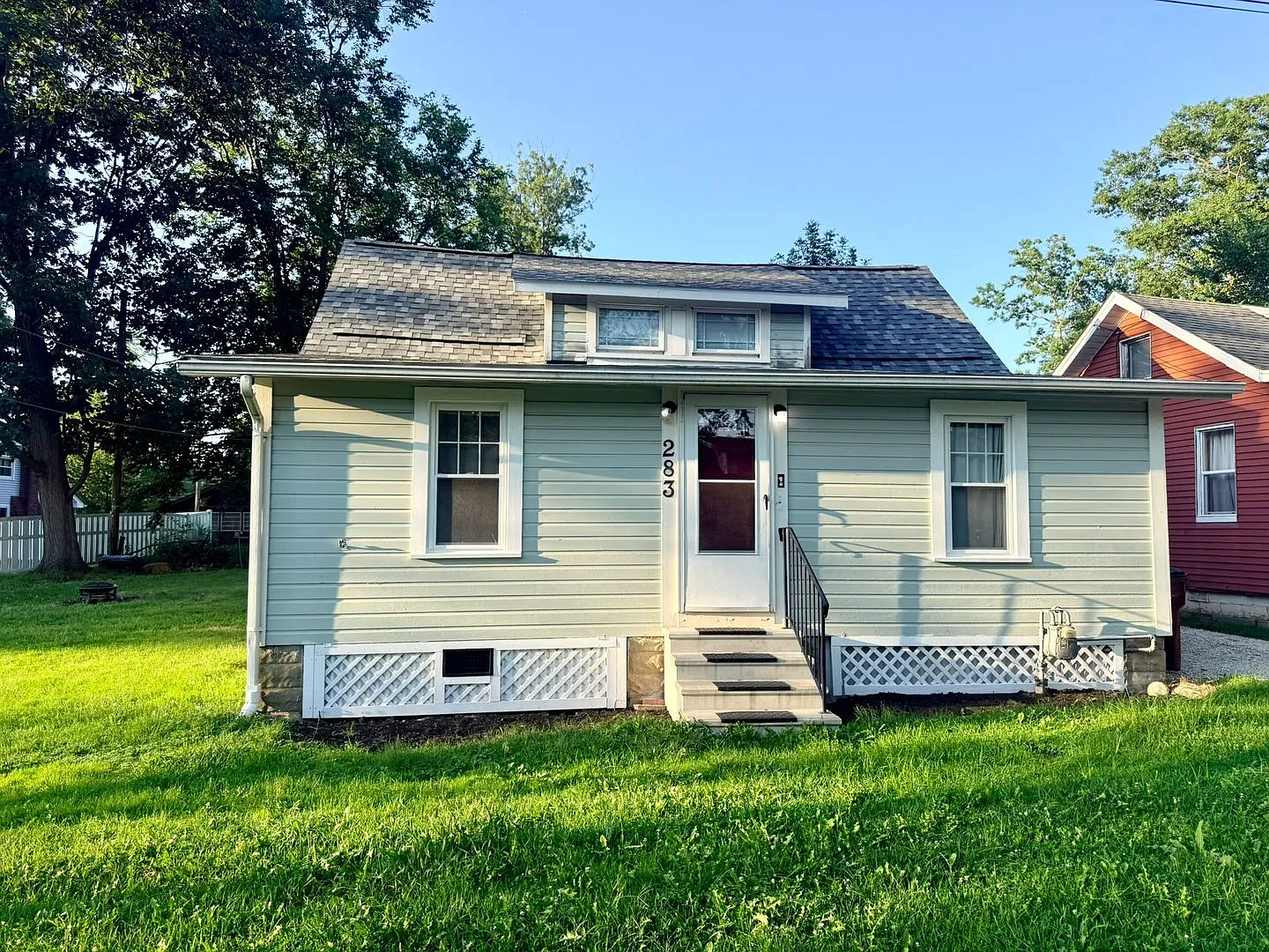Updated Chippewa Lake Home with Spacious Living Areas — Photo 1