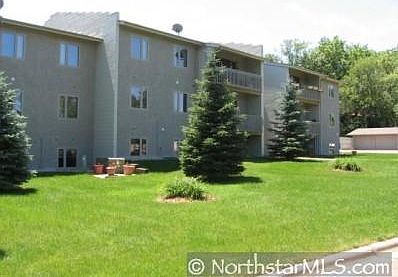 Well-maintained building set in a nice green space next to Lashbrook Park natural lands