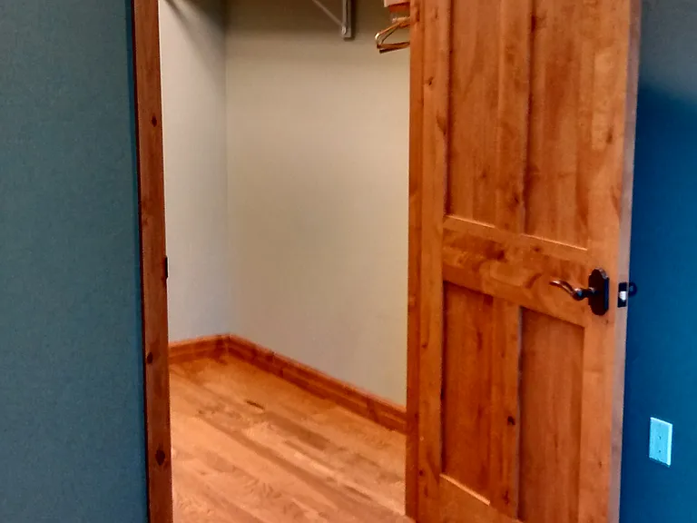 Walk-in closet with two six foot hanging rods