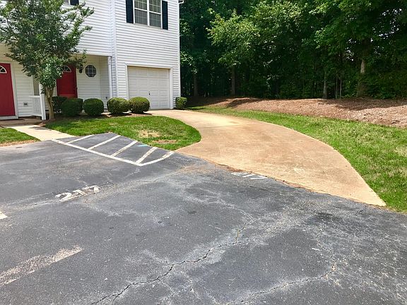 Parking in Garage, Driveway and 1-Assigned Space