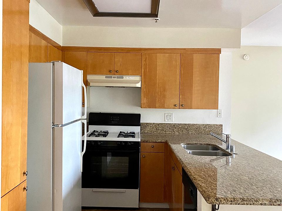 Open kitchen with fridge