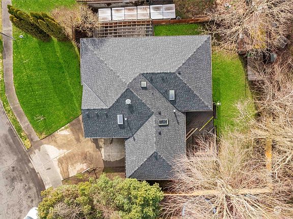 Situated on a .20 acre lot~Private fenced back yard>