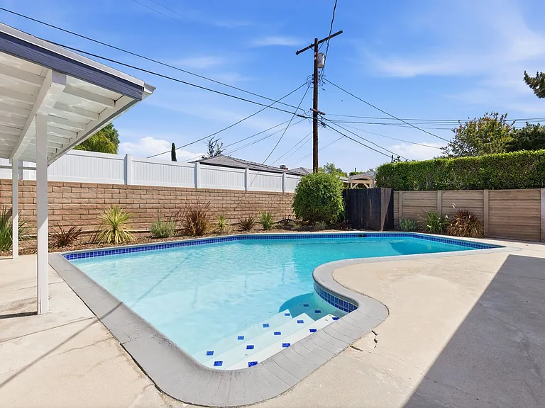 16257 Los Alimos St — Photo 10