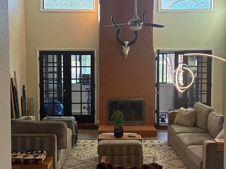 Sunken living room with vaulted ceiling