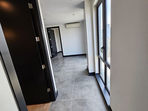 5th image of 1169 Hoe Ave APT 4A