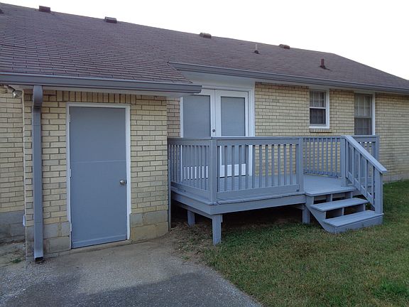Back of house with deck.