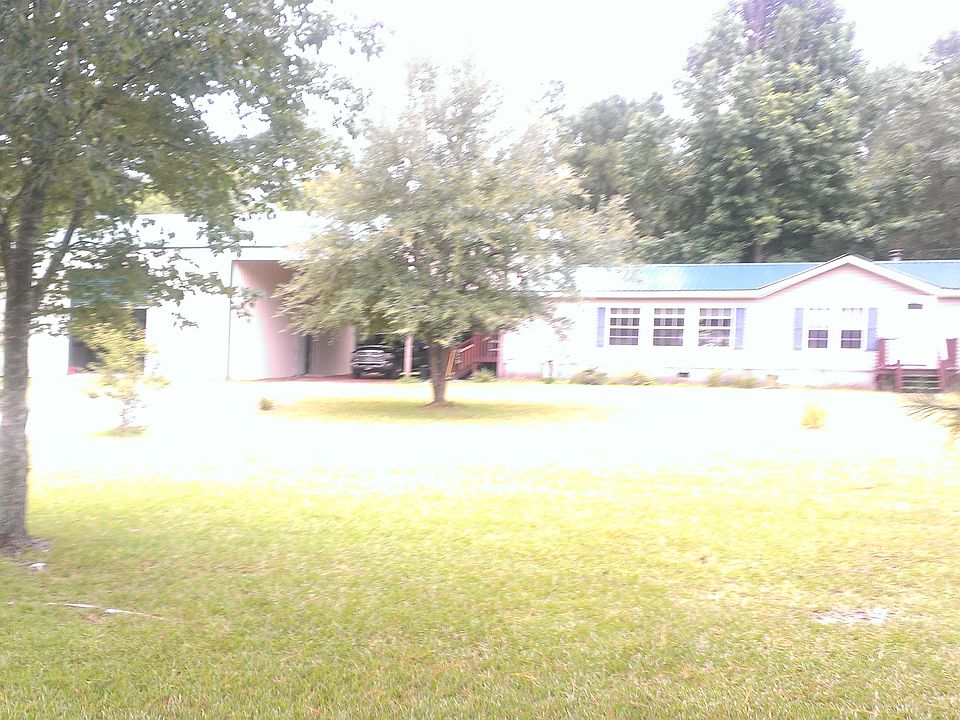Full view of house and shop