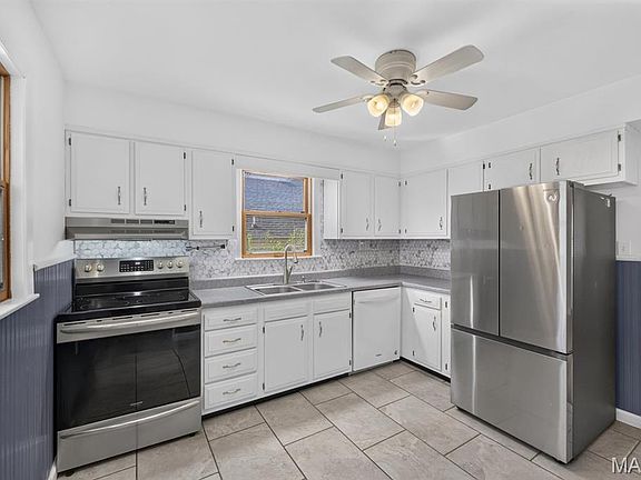 5th image of 7034 Mitchell Ave