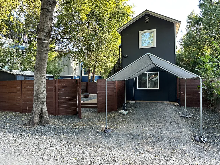 Please note; this is an alley-way home. Here is access to the home but also you can go through Garden St #1 (access is legal.) Parking is under canopy or to the left, parking is also available on Garden st.