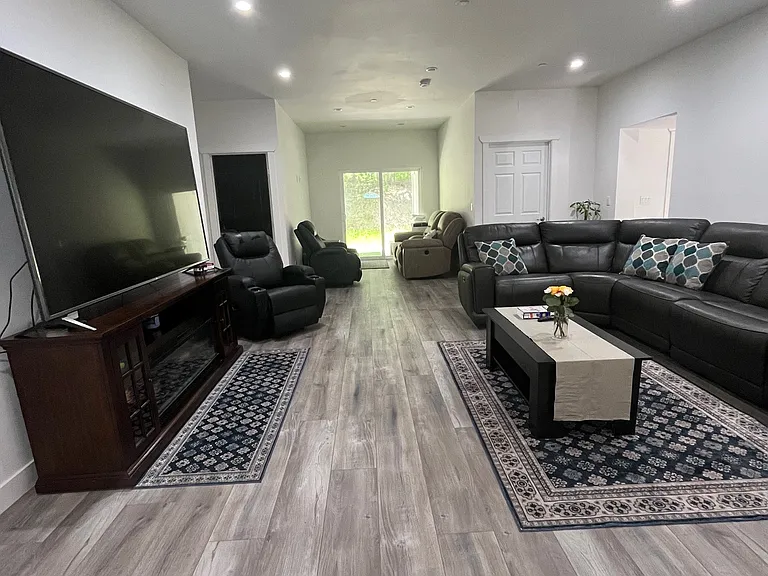 Large living room with extended seating/reading area