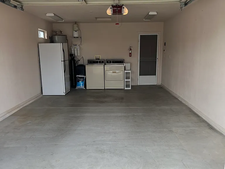 Single car garage attached to 3 bedroom home