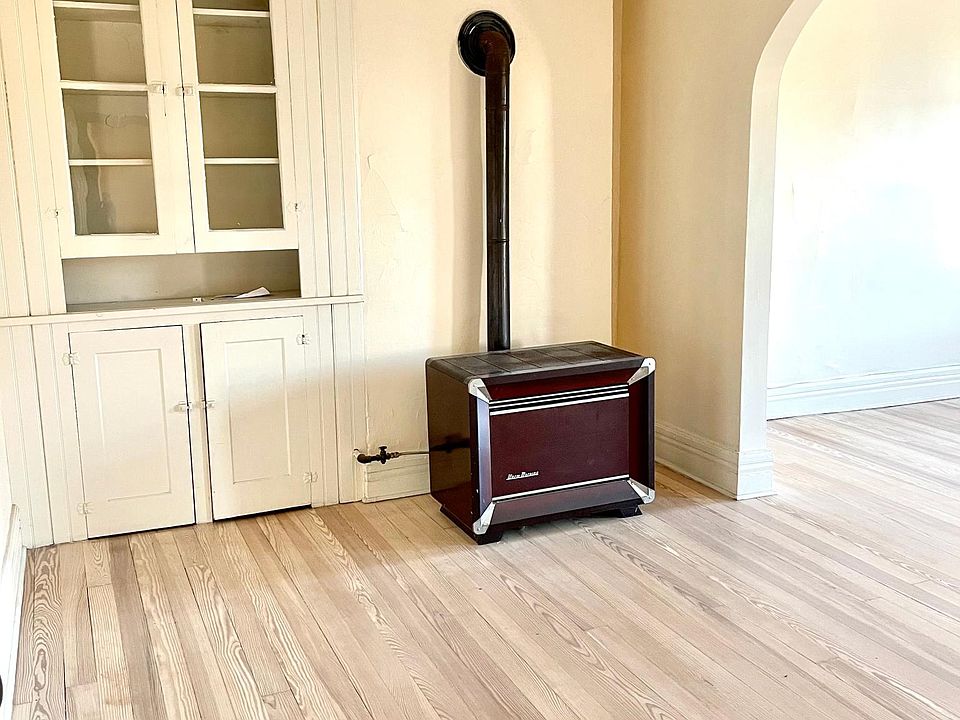 Built-ins and beautifully restored hardwood flooring