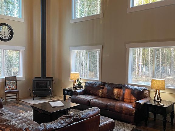 BlazeKing freestanding fireplace for cozy winter days. Lots of natural light!