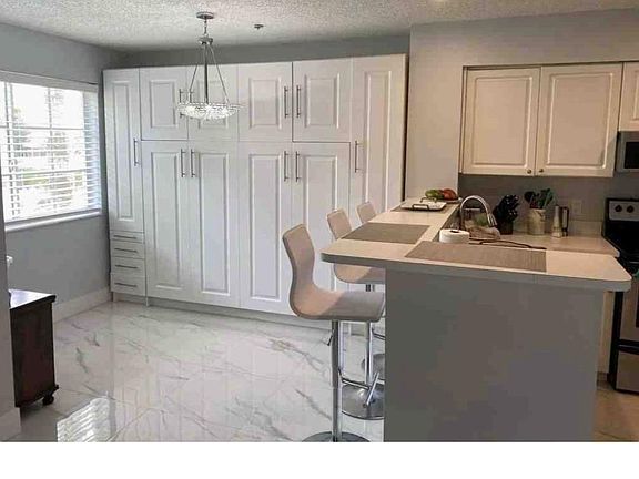 4th image of 12118 Saint Andrews Pl APT 208