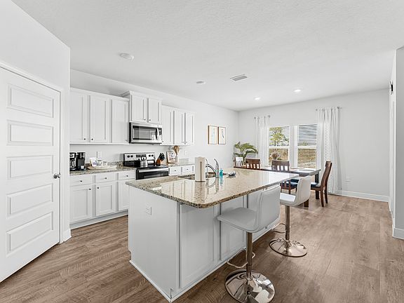Fully stocked kitchen with modern appliances and plenty of space to cook!