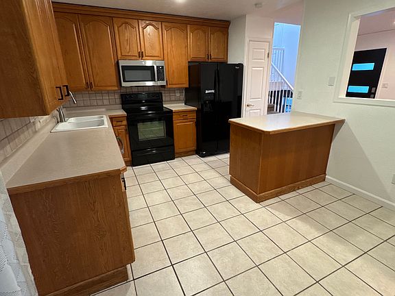 3rd image of 8850 W 92nd Pl