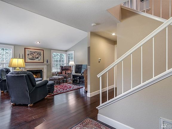 Gleaming engineered hardwood floors have been installed throughout the home. You'll also love the updated white mill work, beautiful paneled doors, and open stairwell.