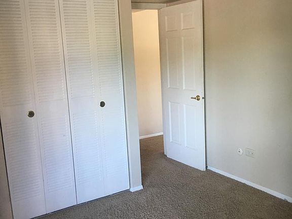 Second bedroom with shared balcony