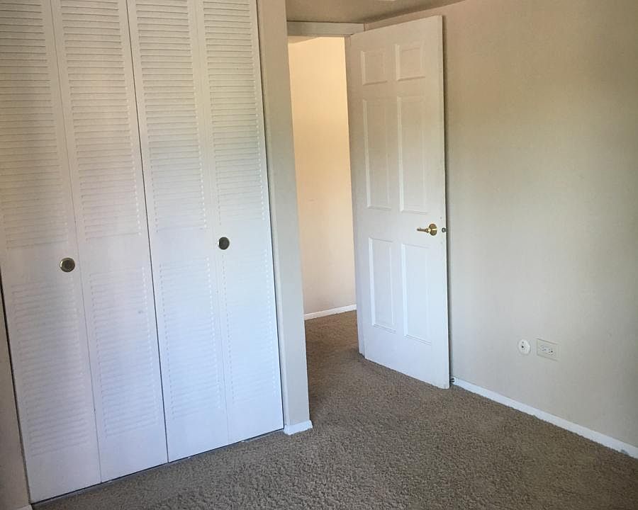 Second bedroom with shared balcony
