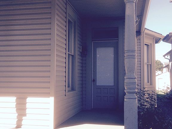 Wraparound front porch.
