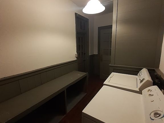Mudroom - laundry hookups, egress door to fire escape, closets, and half bath