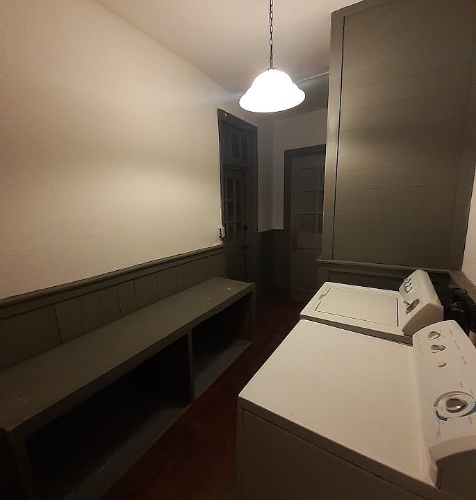 Mudroom - laundry hookups, egress door to fire escape, closets, and half bath