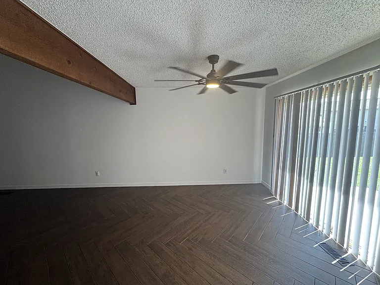 Dining room w/sliding patio door to backyard.