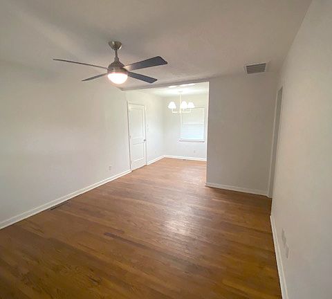 Fresh paint, all new light fixtures. Living and dining area.